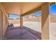 Covered patio overlooking a spacious backyard at 22010 W Solano Dr, Buckeye, AZ 85326