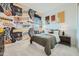 Fun bedroom with a basketball-themed wallpaper and a cozy bed, perfect for  at 23134 E Nightingale Rd, Queen Creek, AZ 85142