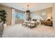 Serene primary bedroom with a large window, stylish furniture, and a cozy atmosphere at 23134 E Nightingale Rd, Queen Creek, AZ 85142