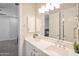 Bathroom with double sink vanity and large mirror at 24314 N 21St Pl, Phoenix, AZ 85024