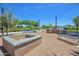 Community area with fire pit, benches, and built-in barbecues at 24314 N 21St Pl, Phoenix, AZ 85024