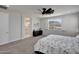 Bright primary bedroom features a scenic view, plush carpet and access to the ensuite bathroom at 24314 N 21St Pl, Phoenix, AZ 85024