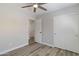 Clean bedroom features wood-look floors, closet and easy access to hall at 2625 E Beverly Rd, Phoenix, AZ 85042