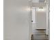 Hallway featuring wood-look floors, neutral walls, and white trim at 2625 E Beverly Rd, Phoenix, AZ 85042