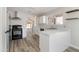 Bright kitchen featuring white countertops, modern appliances and ample counter space at 2625 E Beverly Rd, Phoenix, AZ 85042