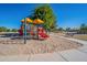Well-equipped community playground with various slides and climbing structures in a sandy play area at 2625 E Beverly Rd, Phoenix, AZ 85042