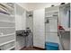 Walk-in closet with custom shelving, drawers, and ample storage space at 29159 N 128Th Ln, Peoria, AZ 85383