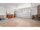 Spacious garage with an automatic door, ample storage, and room for multiple vehicles or hobbies at 29159 N 128Th Ln, Peoria, AZ 85383