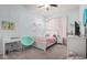 Bedroom with bed, desk, chair, and white furniture at 3081 E Desert Broom Pl, Chandler, AZ 85286