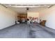 Spacious garage with ample storage space and overhead lighting at 3081 E Desert Broom Pl, Chandler, AZ 85286