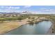 Beautiful aerial view of the golf course, water, and the scenic mountain backdrop at 33575 N Dove Lakes Dr # 2033, Cave Creek, AZ 85331