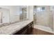 This bathroom features a double sink vanity and a glass-enclosed shower at 33575 N Dove Lakes Dr # 2033, Cave Creek, AZ 85331