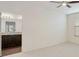 Bedroom with updated fixtures, closet, and a view into the updated bathroom at 33575 N Dove Lakes Dr # 2033, Cave Creek, AZ 85331