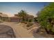 Elegant home featuring a tile roof, manicured landscaping, and a private entry walkway, perfect for curb appeal at 3514 E Desert Broom E Way, Phoenix, AZ 85044