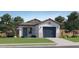 Charming single-story home featuring a desert landscape and a two-car garage at 36620 W Maddaloni Ave, Maricopa, AZ 85138