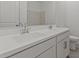 Bathroom with double sinks, white countertops, and modern fixtures at 3913 S 233Rd Ln, Buckeye, AZ 85326