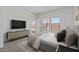 Comfortable Primary bedroom with neutral decor and a TV console at 3913 S 233Rd Ln, Buckeye, AZ 85326