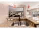 Kitchen sink with granite countertop and view of living area at 41638 N Emerald Lake Dr, Anthem, AZ 85086