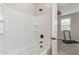 Clean bathroom featuring a tiled shower/tub combination with black fixtures at 4514 W Hazel Ln, San Tan Valley, AZ 85144
