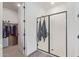 Bathroom featuring a glass-enclosed shower and walk-in closet at 4514 W Hazel Ln, San Tan Valley, AZ 85144