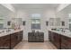 Elegant bathroom with dual vanities and updated fixtures at 4514 W Hazel Ln, San Tan Valley, AZ 85144