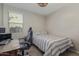 Bedroom with a desk and cozy decor at 4514 W Hazel Ln, San Tan Valley, AZ 85144