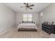 Comfortable bedroom featuring neutral tones and plenty of natural light at 4514 W Hazel Ln, San Tan Valley, AZ 85144