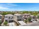 Aerial view of homes in a well-planned community, complete with low-maintenance desert landscaping at 4527 E Gagarinite Ln, San Tan Valley, AZ 85143