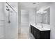 This bathroom includes a double sink vanity and walk-in shower at 4527 E Gagarinite Ln, San Tan Valley, AZ 85143