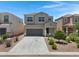 Charming two-story home with a well-maintained front yard and a two-car garage at 4527 E Gagarinite Ln, San Tan Valley, AZ 85143