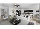 Bright and airy living room featuring modern furniture, stylish decor, and an open-concept design at 4527 E Gagarinite Ln, San Tan Valley, AZ 85143