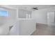 Open loft area with neutral carpet and a window providing natural light at 4527 E Gagarinite Ln, San Tan Valley, AZ 85143