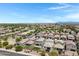 Scenic street view of new homes boasting desert landscaping, and mountain views at 4527 E Gagarinite Ln, San Tan Valley, AZ 85143