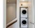 Convenient laundry area features stacked washer and dryer units, maximizing space and efficiency at 4747 N Scottsdale Rd # 4009, Scottsdale, AZ 85251