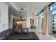 Inviting living space with a comfortable sofa, modern decor, and seamless access to the scenic balcony at 4747 N Scottsdale Rd # 4009, Scottsdale, AZ 85251
