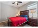 Bedroom showcasing carpet, a ceiling fan, and a matching furniture set at 5341 W Alta Mesa Ave, Laveen, AZ 85339