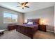 Comfortable bedroom with a ceiling fan and bright natural light at 5341 W Alta Mesa Ave, Laveen, AZ 85339