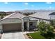 Stunning aerial view of a single-Gathering home with well-maintained landscaping and mountain views at 5341 W Alta Mesa Ave, Laveen, AZ 85339