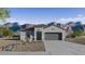 Charming single-story home with desert landscaping and mountain views in a vibrant community at 5827 E Axle Ln, San Tan Valley, AZ 85140