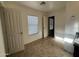 Bright bathroom with a granite vanity, natural lighting from the window, and tile flooring at 6341 W Valencia Dr, Laveen, AZ 85339