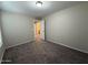 Neutral bedroom featuring neutral walls and plush carpeting at 6341 W Valencia Dr, Laveen, AZ 85339
