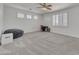 Comfortable bedroom with ample space, natural light, and a ceiling fan at 7129 S Stadium Way, Gilbert, AZ 85298