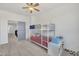 Bedroom featuring bunk beds, ceiling fan and ample closet space at 7129 S Stadium Way, Gilbert, AZ 85298