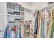Organized closet with clothes racks, open shelving, and ample storage space for clothing and accessories at 7129 S Stadium Way, Gilbert, AZ 85298