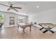Game room with pool table, foosball table, and great natural light at 7129 S Stadium Way, Gilbert, AZ 85298
