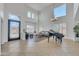 Grand living room featuring high ceilings and lots of natural light at 7129 S Stadium Way, Gilbert, AZ 85298