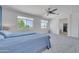 Bright and airy bedroom featuring plush carpeting, large windows, and a view of the closet at 7129 S Stadium Way, Gilbert, AZ 85298