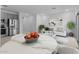 Bright living space with view of the kitchen, dining area, and modern decor at 7434 S 75Th Dr, Laveen, AZ 85339