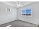 Bedroom with large windows and neutral carpet at 751 W Flintlock Way, Chandler, AZ 85286