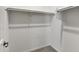 Walk-in closet with ample storage space and a carpeted floor, perfect for organizing your wardrobe at 751 W Flintlock Way, Chandler, AZ 85286